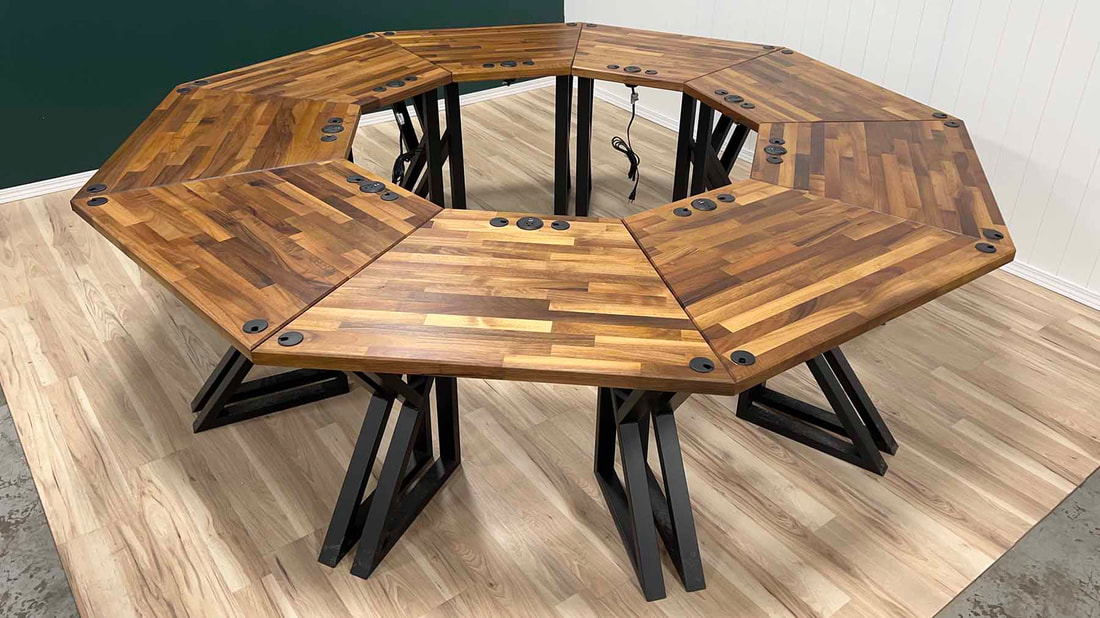 Picture of a 9 sided podcast table made from dark walnut wood and metal table legs